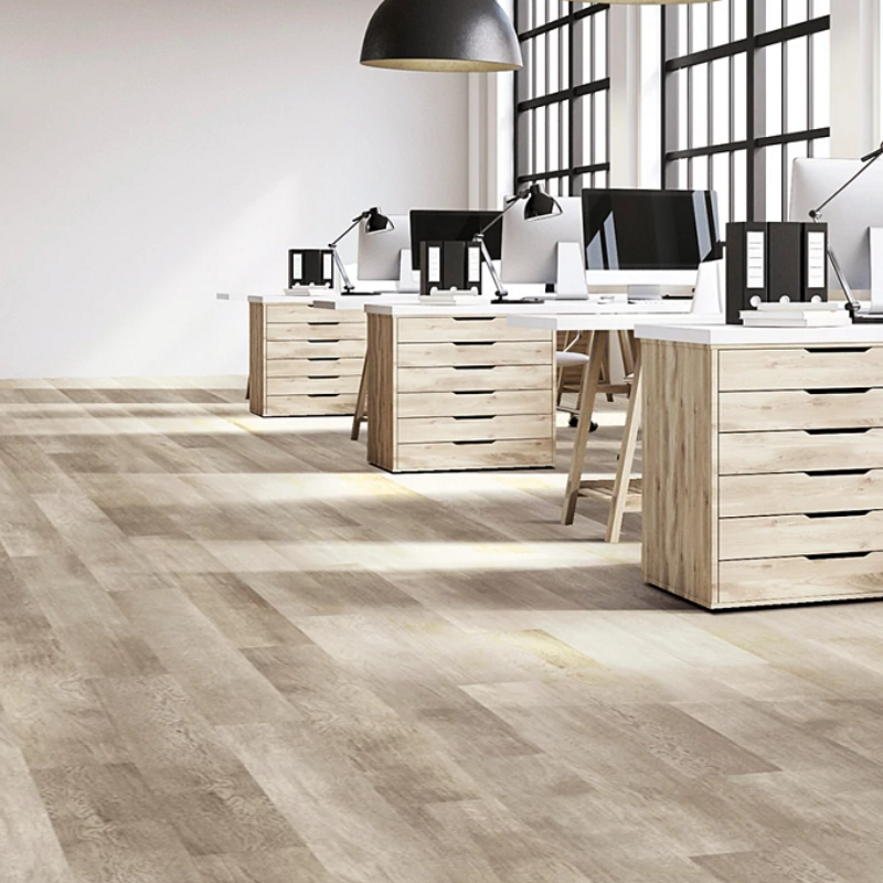 Commercial Vinyl Flooring In An Office Space With Work Desks & Chairs