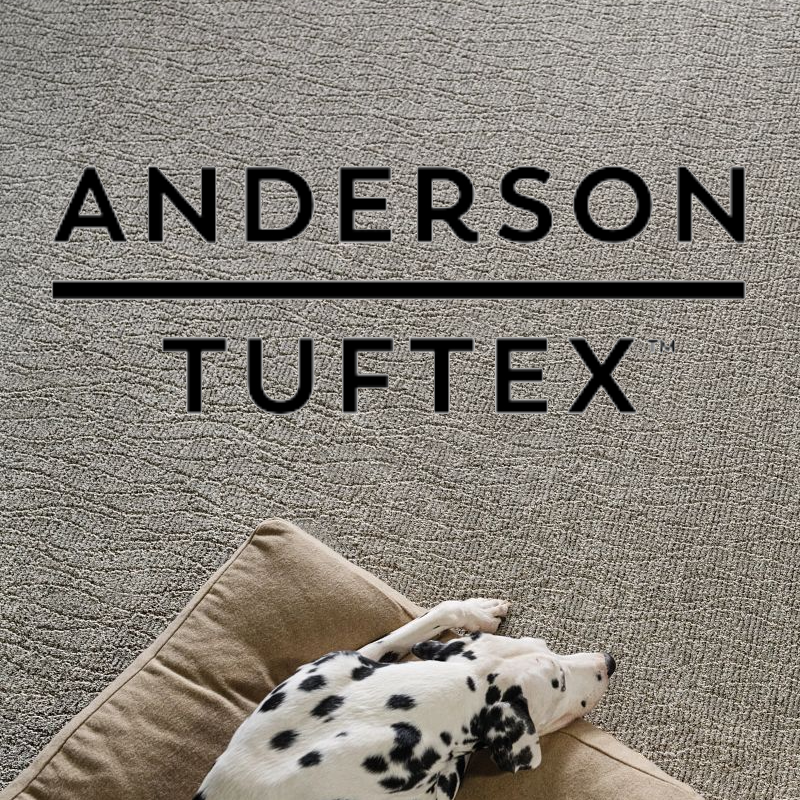 Anderson Tuftex Logo Superimposed over image of Dog resting on a Pet-Perfect, Anderson Tuftex carpet.